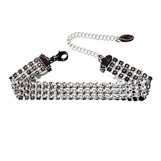 sparkly white bow anklet on white background