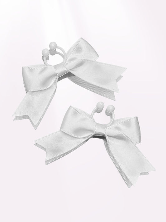 White Bow Nipple Jewelry Accessories on Light Pink Background