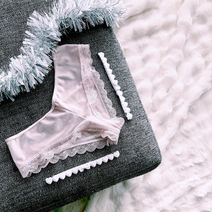 white heart bow leg garters with pink lingerie