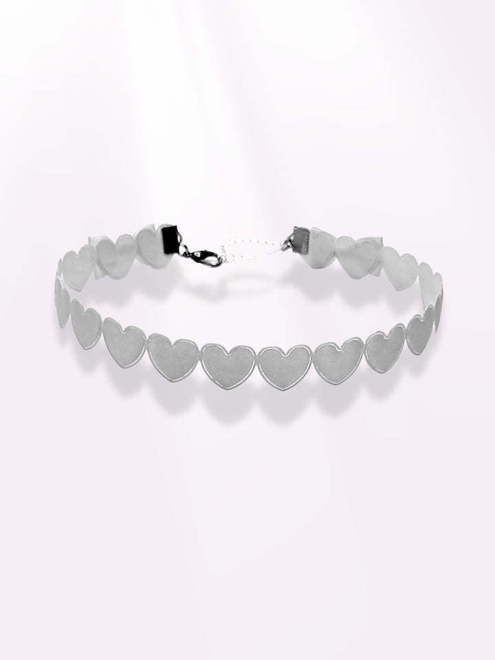 white heart bow choker on light pink background
