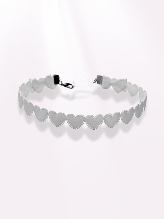 white heart bow choker on light pink background